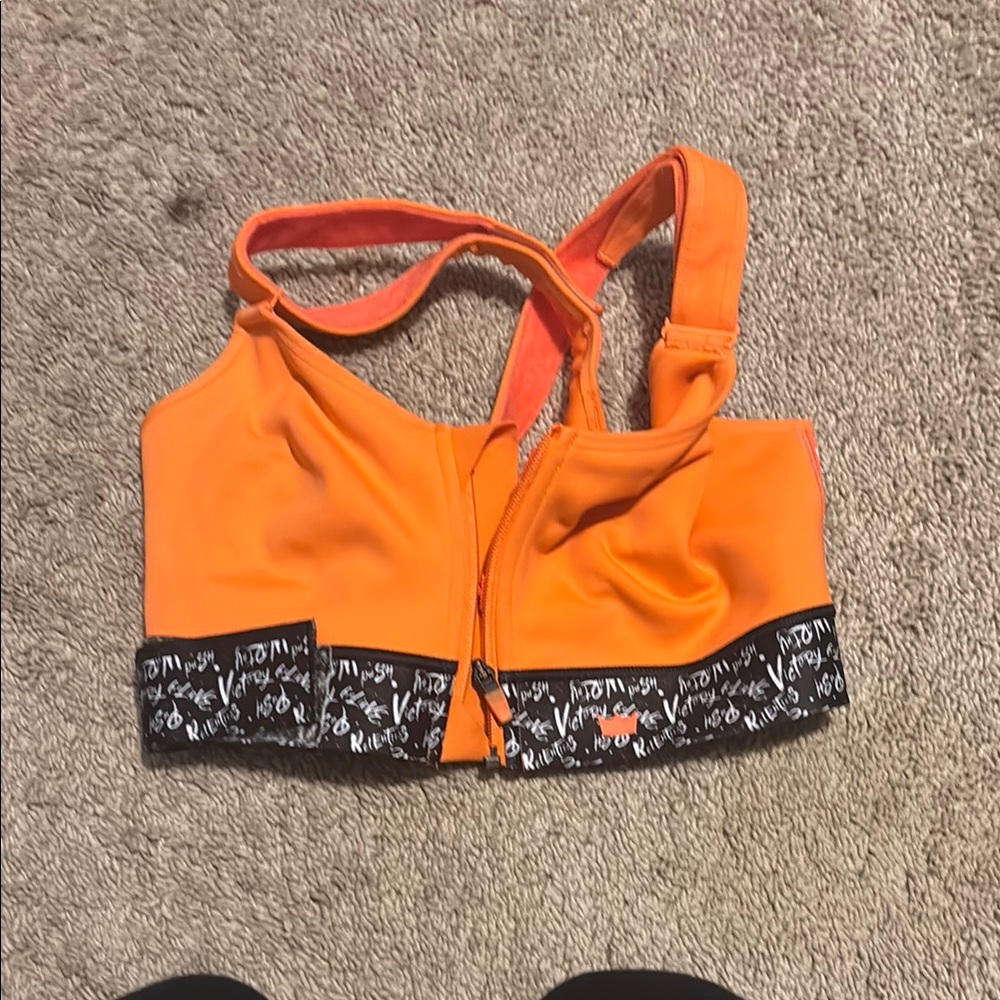 Vibrant Orange Sports Bra with Black and White Trim